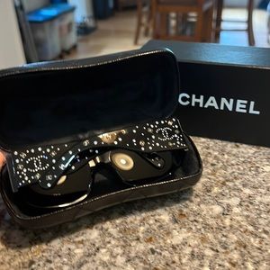 NWB- authentic black rimmed Chanel sunglasses w/Swarovski crystals.  Never worn.